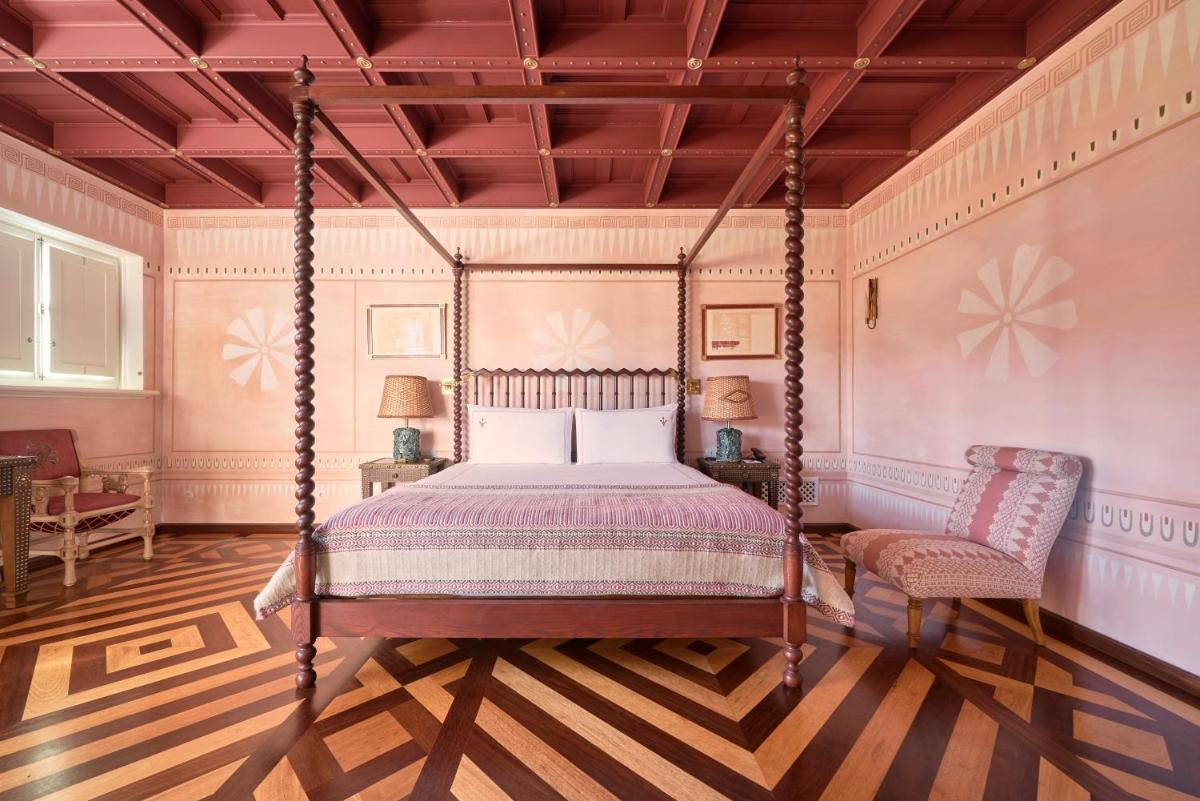 Uma cama ou camas num quarto em Vermelho Melides - Relais & Châteaux