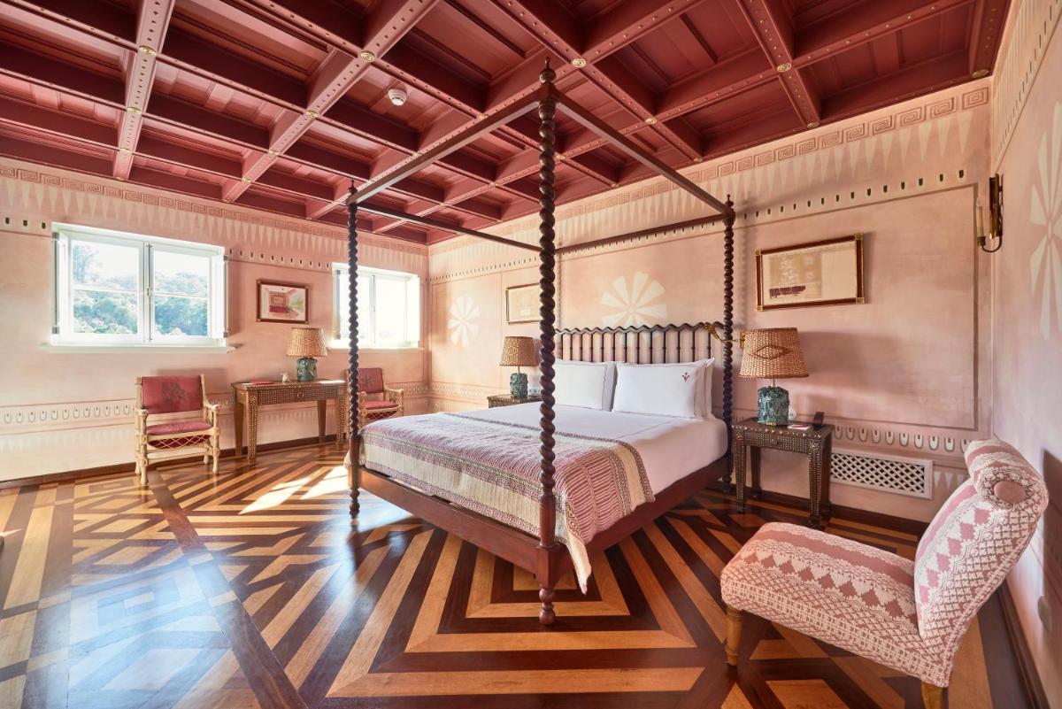 Uma cama ou camas num quarto em Vermelho Melides - Relais & Châteaux