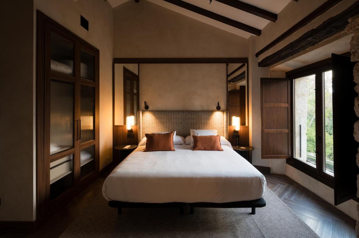 Cama o camas de una habitación en Castilla Termal Brihuega