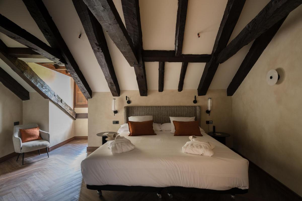 Cama o camas de una habitación en Castilla Termal Brihuega