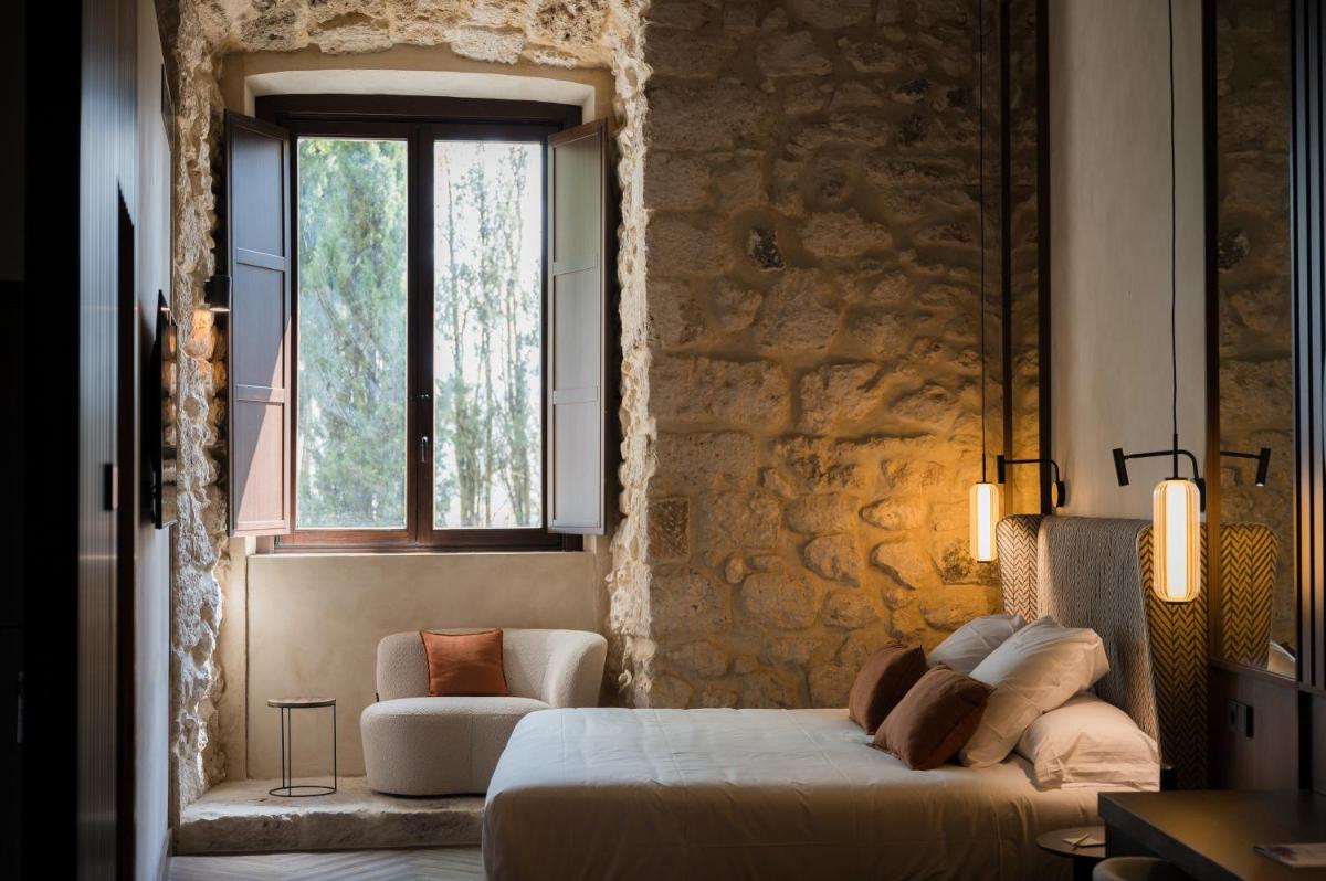 Cama o camas de una habitación en Castilla Termal Brihuega