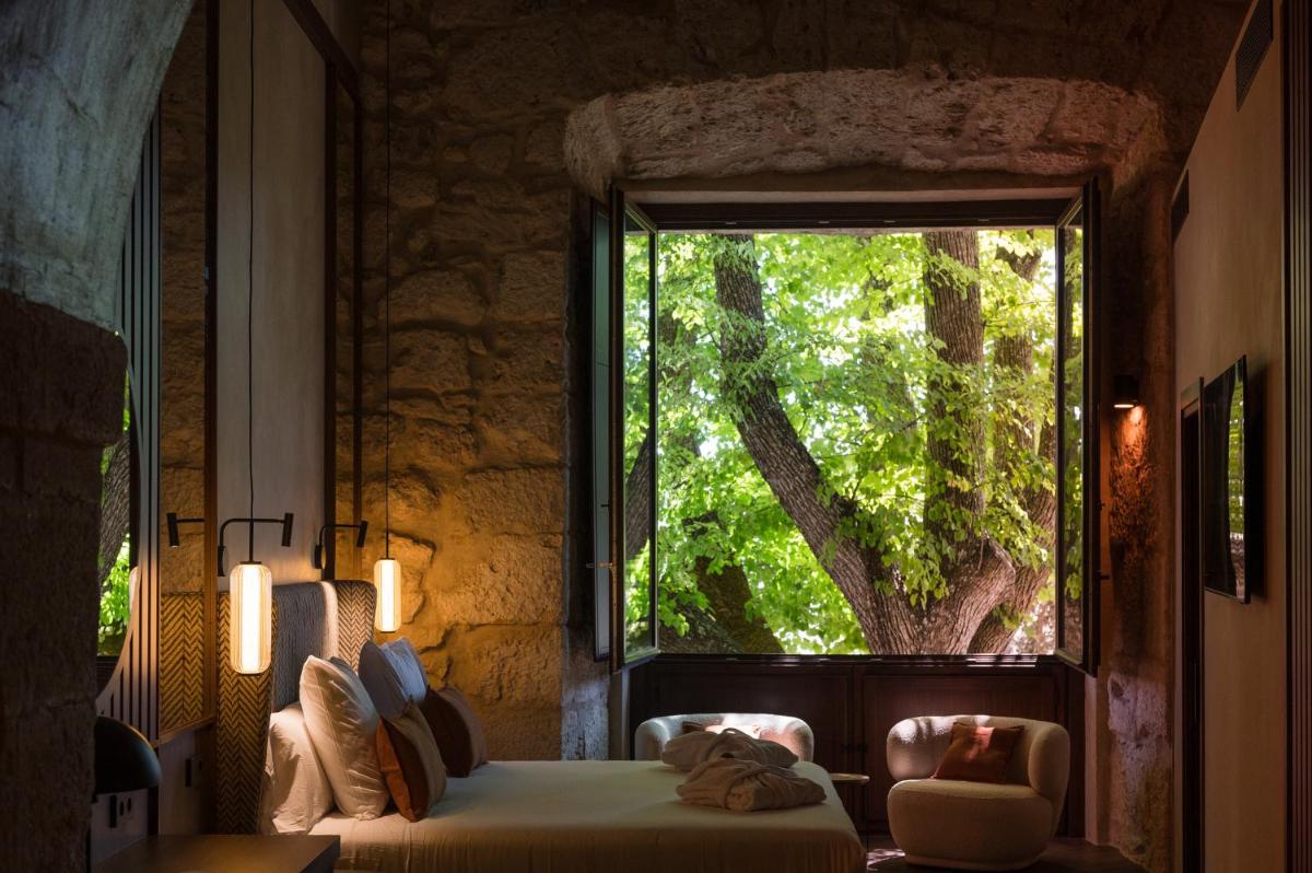 Cama o camas de una habitación en Castilla Termal Brihuega