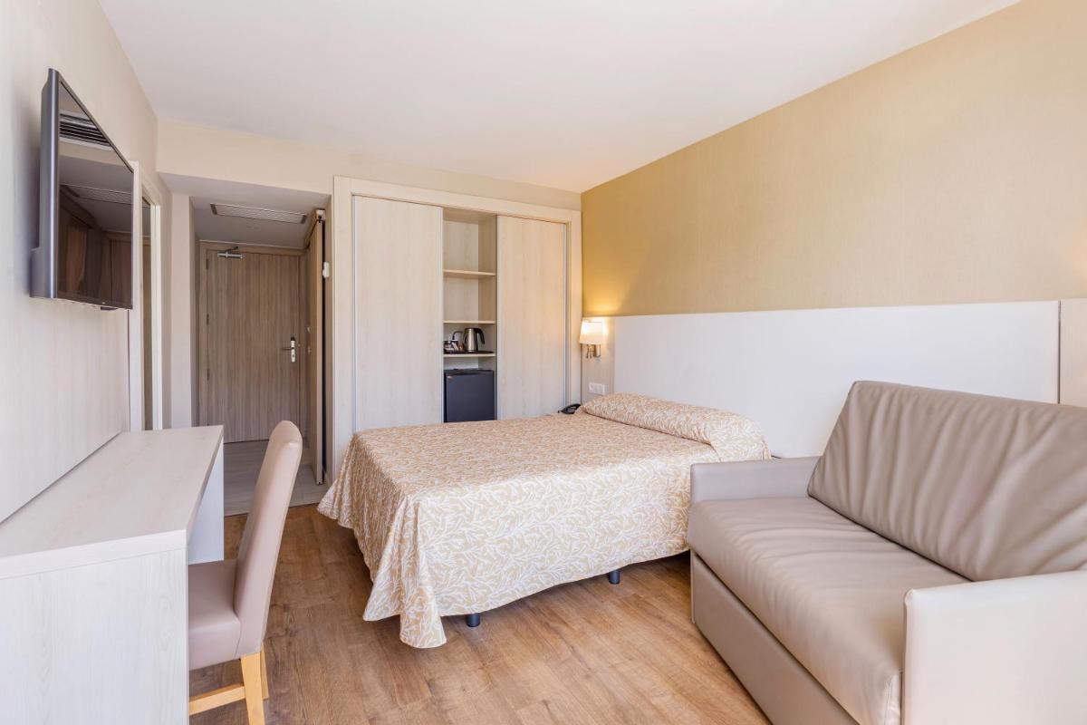 Cama o camas de una habitación en Hotel Best Maritim