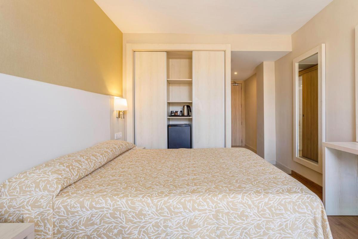 Cama o camas de una habitación en Hotel Best Maritim