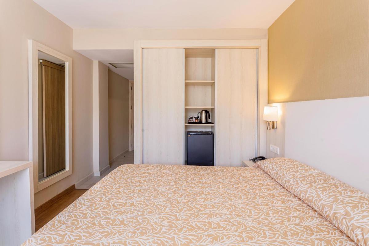 Cama o camas de una habitación en Hotel Best Maritim