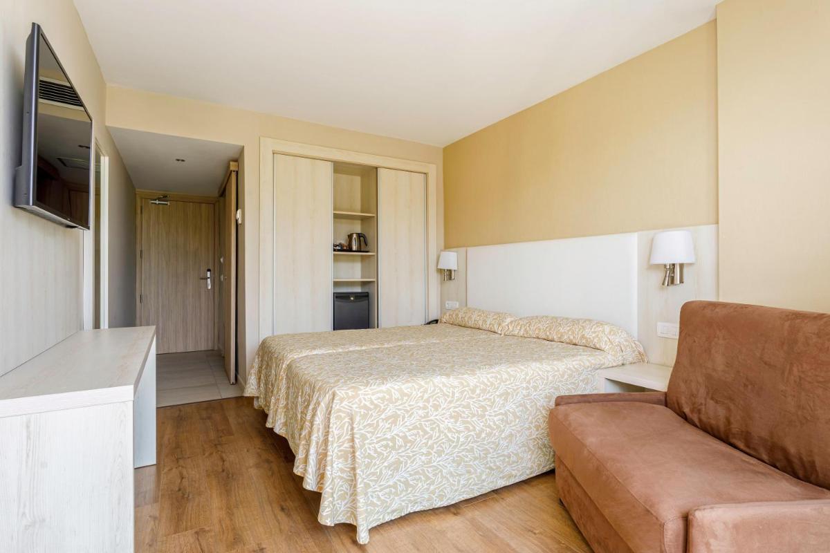 Cama o camas de una habitación en Hotel Best Maritim