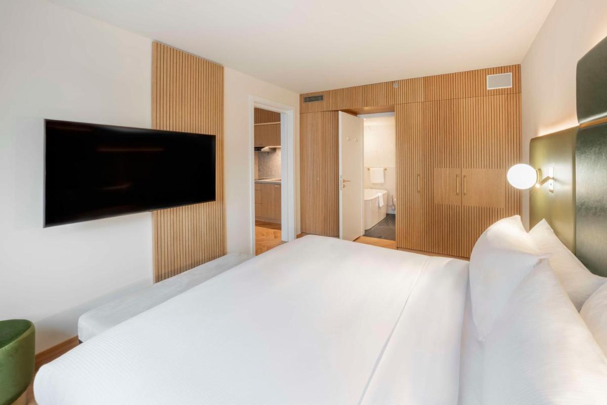 Ein Bett oder Betten in einem Zimmer der Unterkunft Hilton Berlin