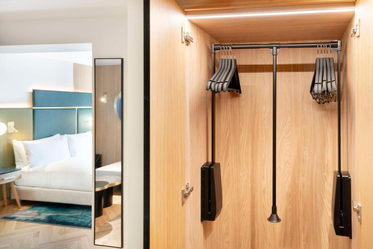 Ein Bett oder Betten in einem Zimmer der Unterkunft Hilton Berlin