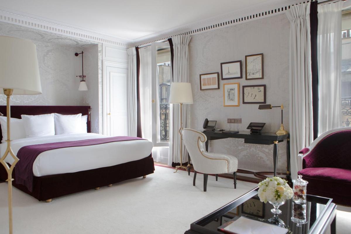 Un ou plusieurs lits dans un hébergement de l'établissement La Réserve Paris Hotel & Spa