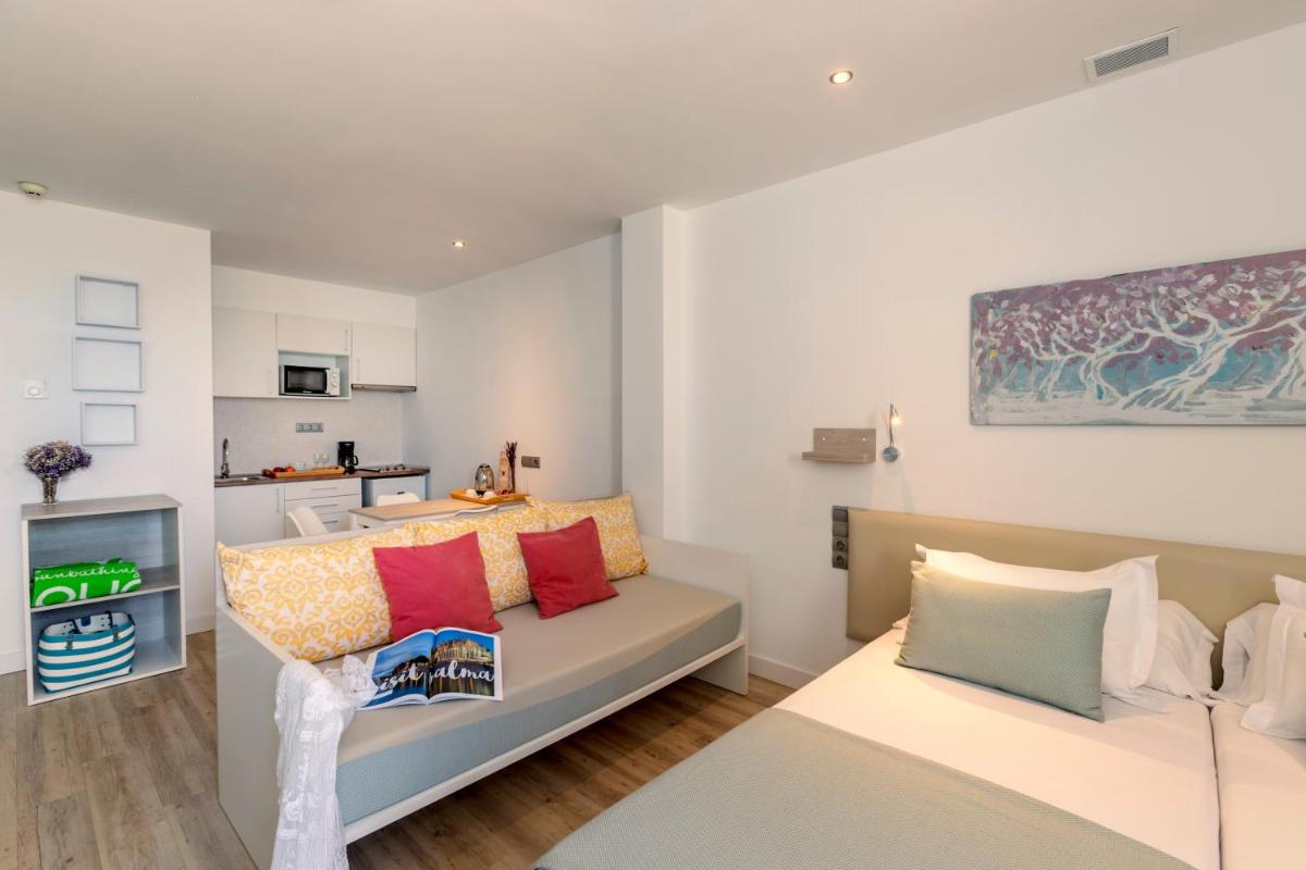 Cama o camas de una habitación en Houm Plaza Son Rigo