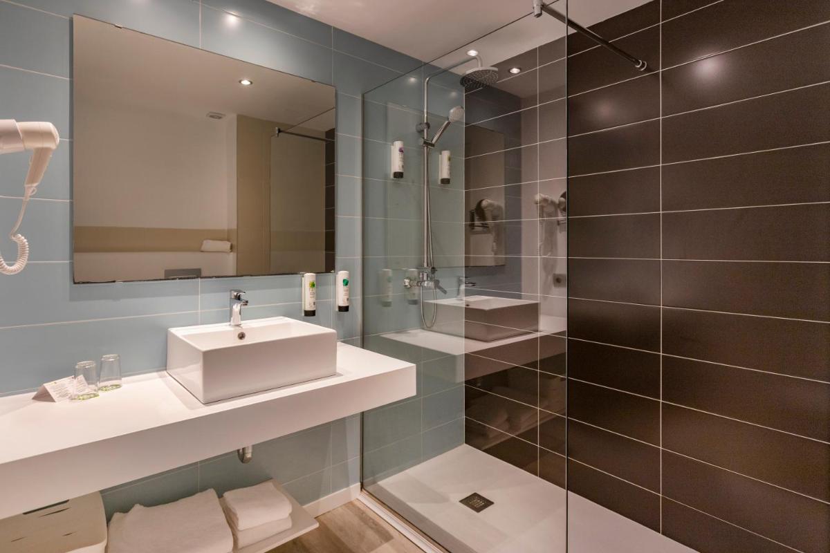 Un baño de Houm Plaza Son Rigo