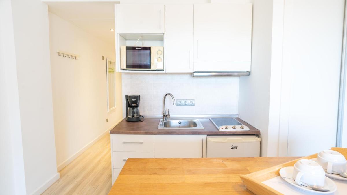 Una cocina o zona de cocina en Houm Plaza Son Rigo