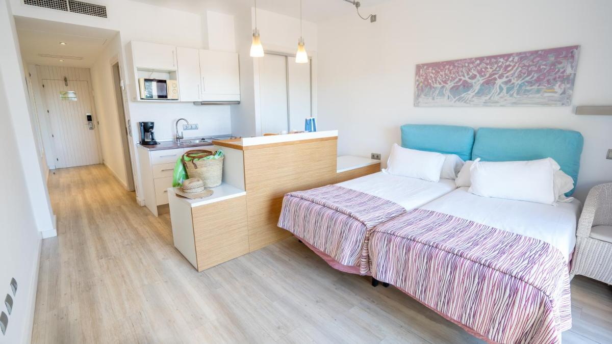 Cama o camas de una habitación en Houm Plaza Son Rigo