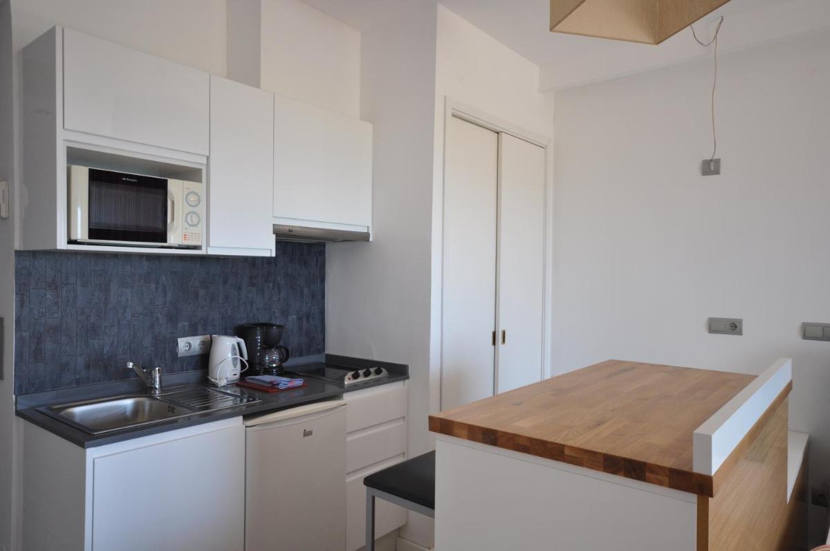 Una cocina o zona de cocina en Houm Plaza Son Rigo