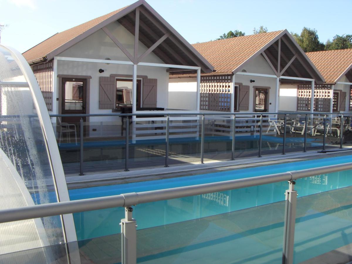 Domki Letniskowe Marzena - Housity