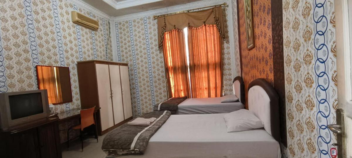 OYO 93123 Wisma Hamalau Syariah - Housity