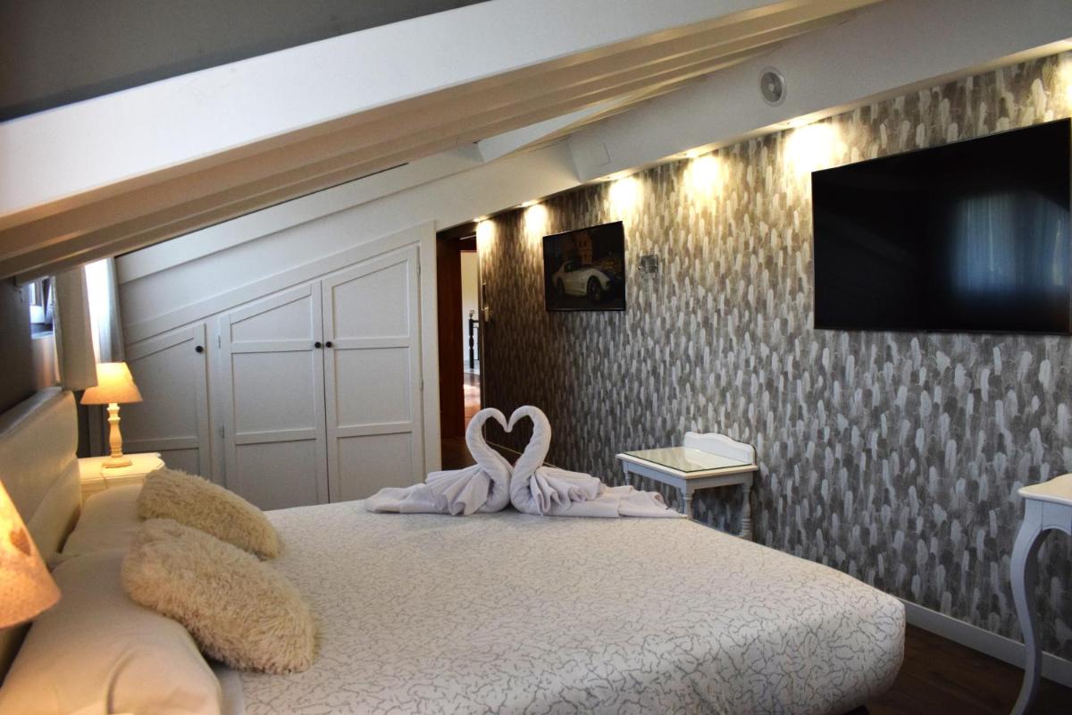 Cama o camas de una habitación en Hotel Spa San Marcos