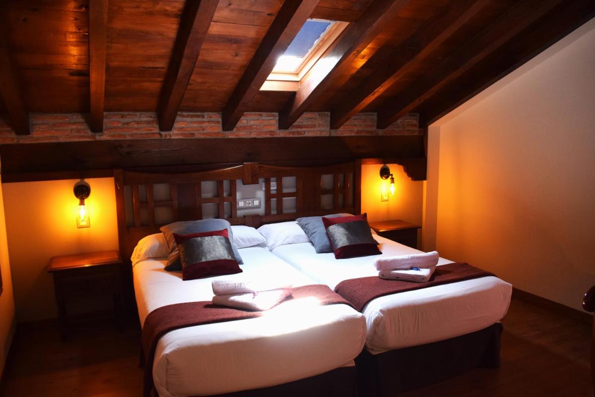 Cama o camas de una habitación en Hotel Spa San Marcos