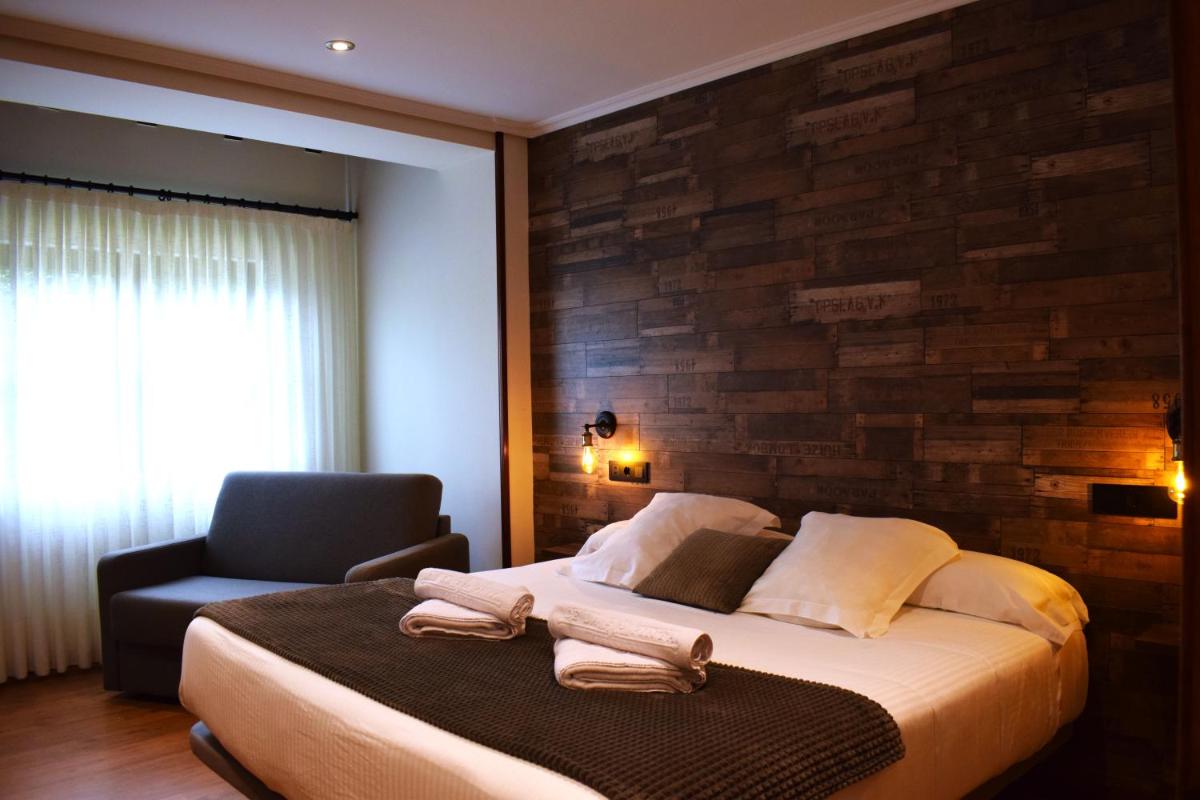 Cama o camas de una habitación en Hotel Spa San Marcos
