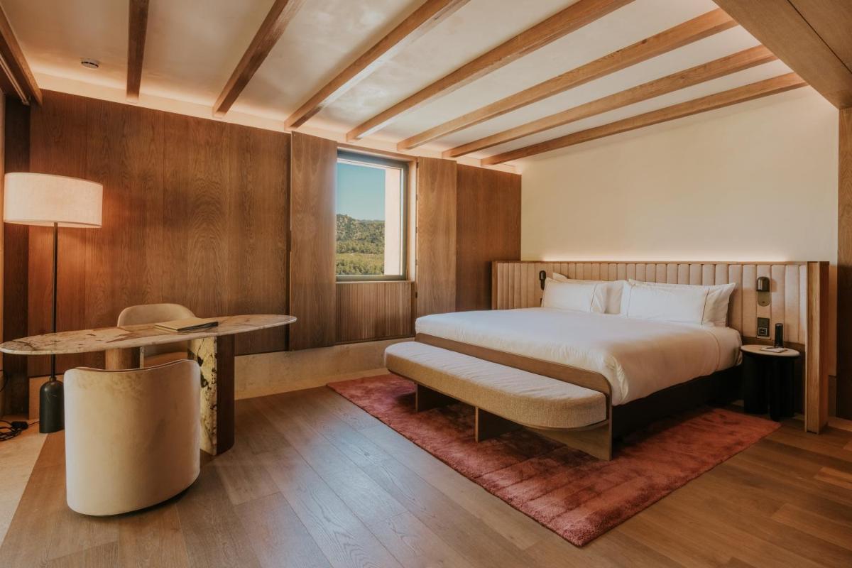 Cama o camas de una habitación en Gran Hotel Mas d'en Bruno