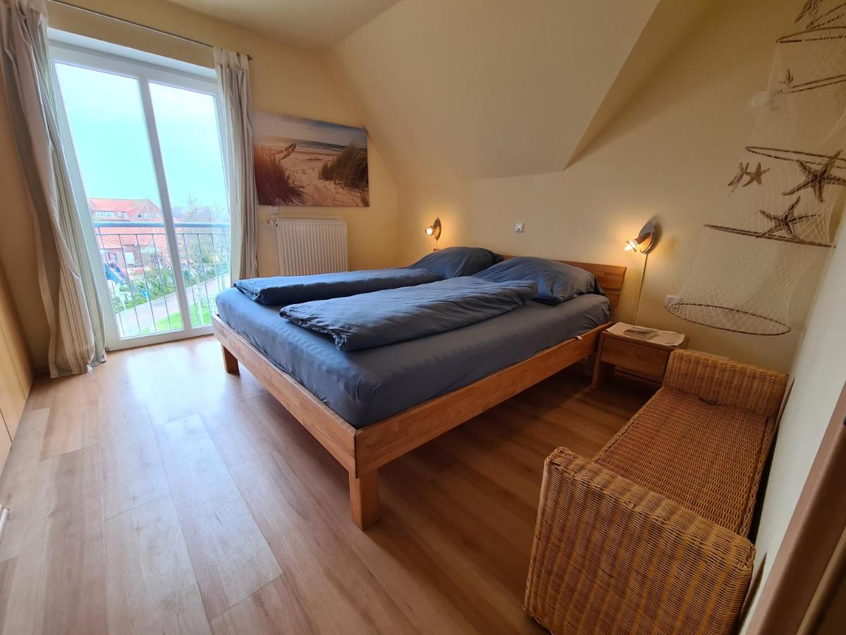 Ferienwohnung Meeresblick Norddeich mit Balkon - Housity
