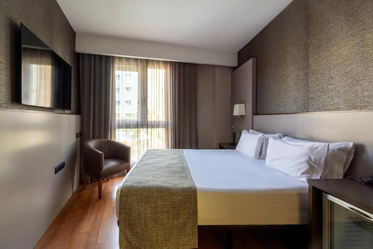 Cama o camas de una habitación en Catalonia Atenas