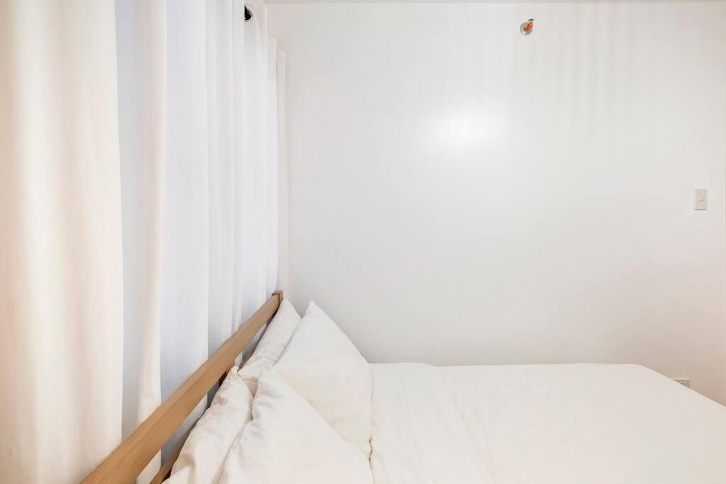 Bohemian Inspired 2 Bedroom Inspired Condo with Fast WIFI Near BGC - Housity