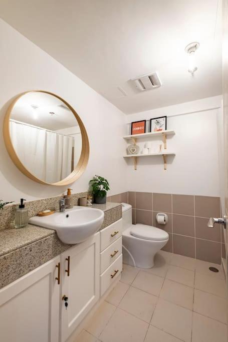 Bohemian Inspired 2 Bedroom Inspired Condo with Fast WIFI Near BGC - Housity