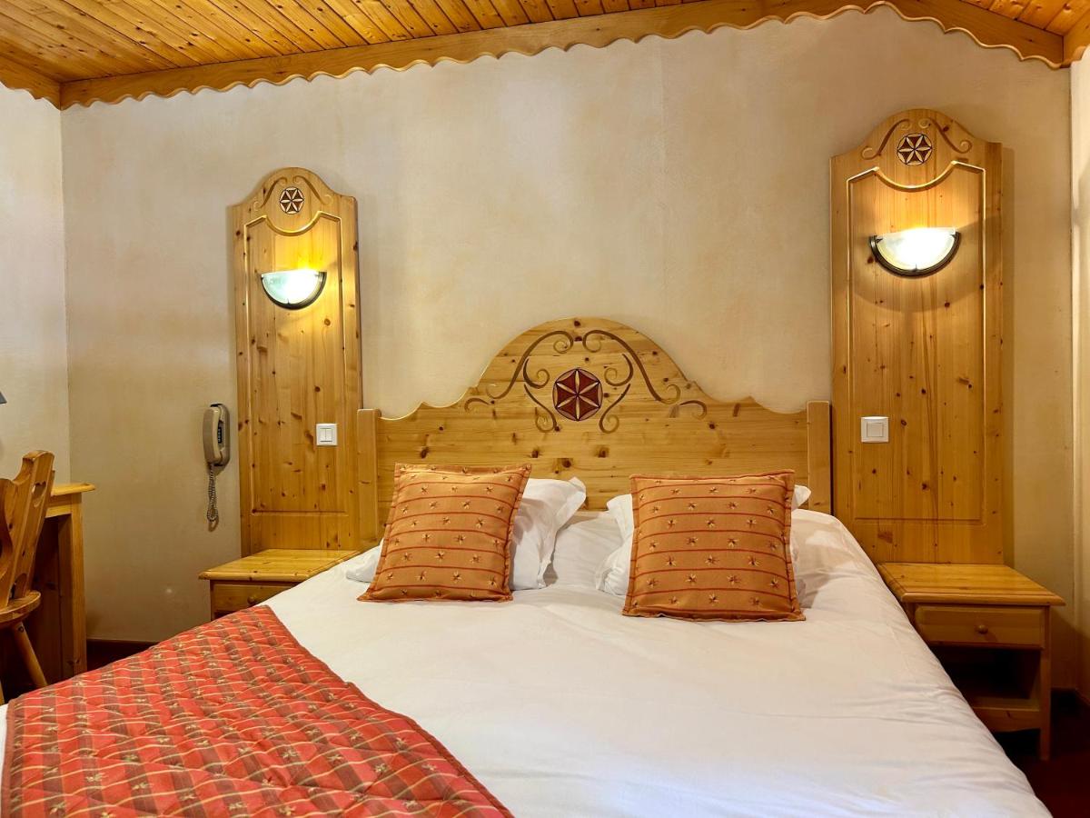 Un ou plusieurs lits dans un hébergement de l'établissement Hameau des Prodains - Hôtel