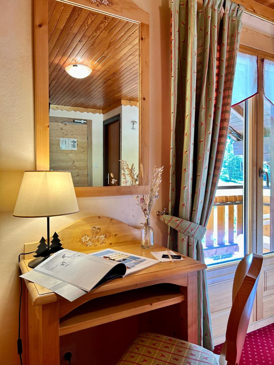 Un ou plusieurs lits dans un hébergement de l'établissement Hameau des Prodains - Hôtel