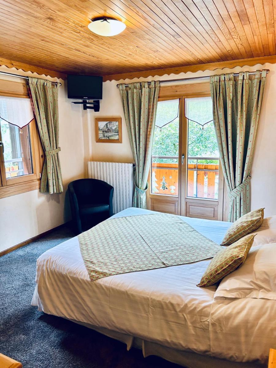 Un ou plusieurs lits dans un hébergement de l'établissement Hameau des Prodains - Hôtel