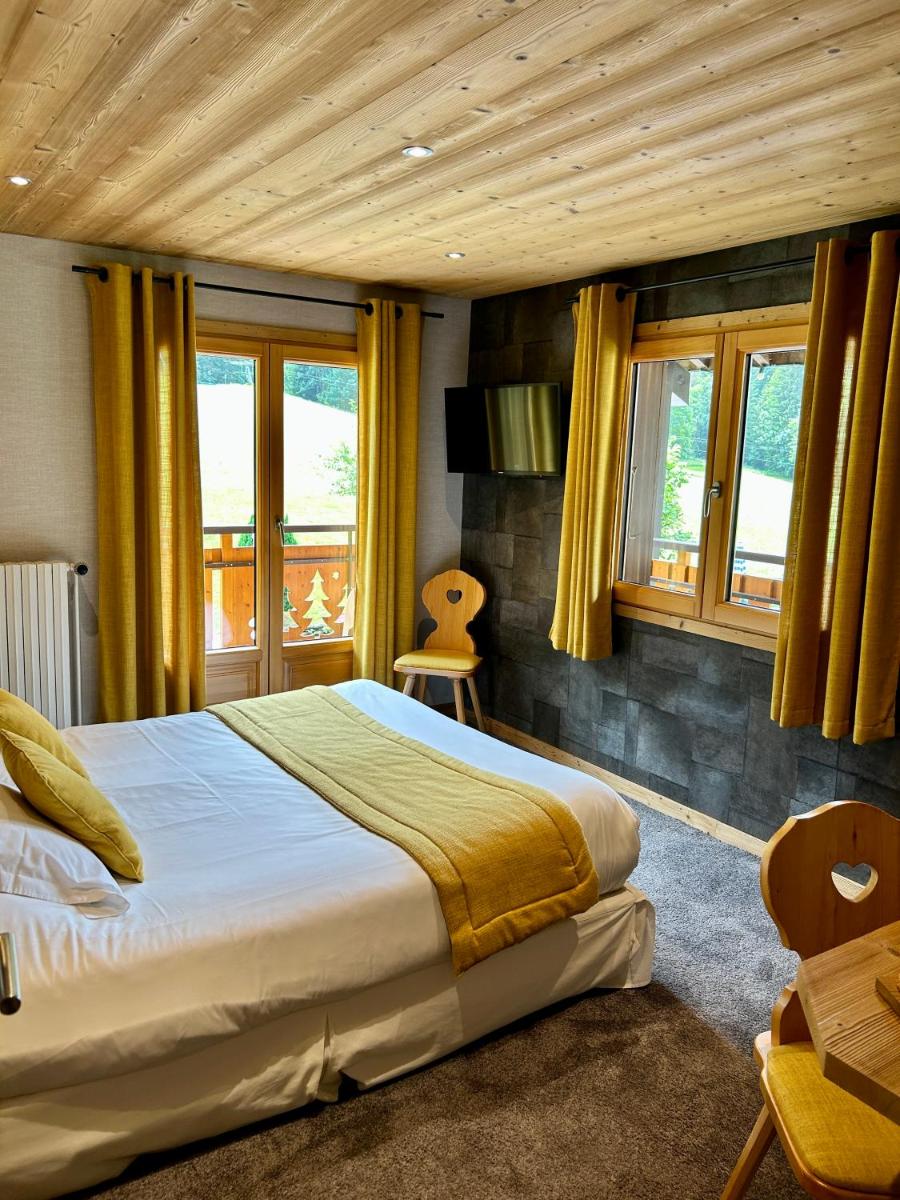 Un ou plusieurs lits dans un hébergement de l'établissement Hameau des Prodains - Hôtel