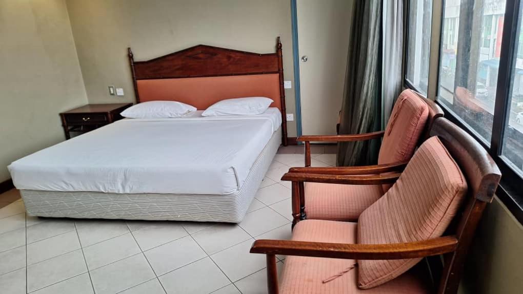 Hotel Ming Kiong - Housity