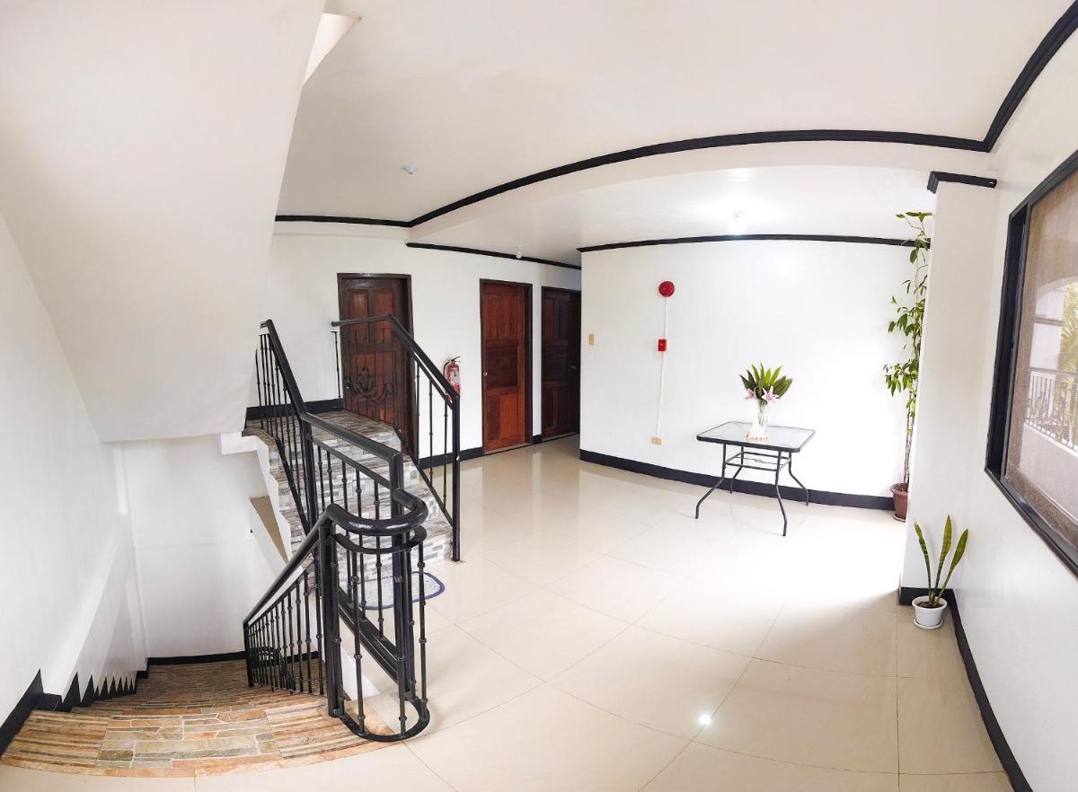 Suitetrails - Amparo's Tourist Inn - Coron