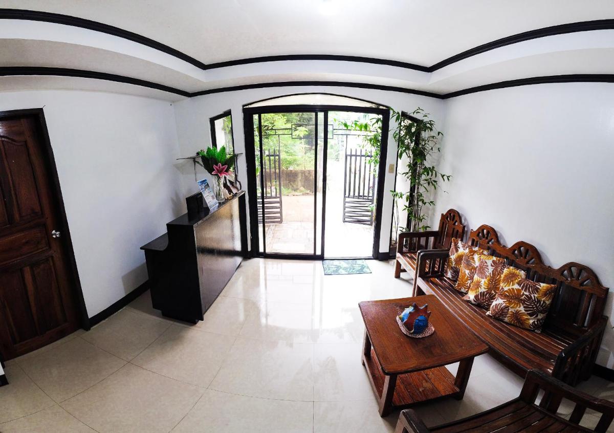 Amparo's Tourist Inn - Coron - Housity