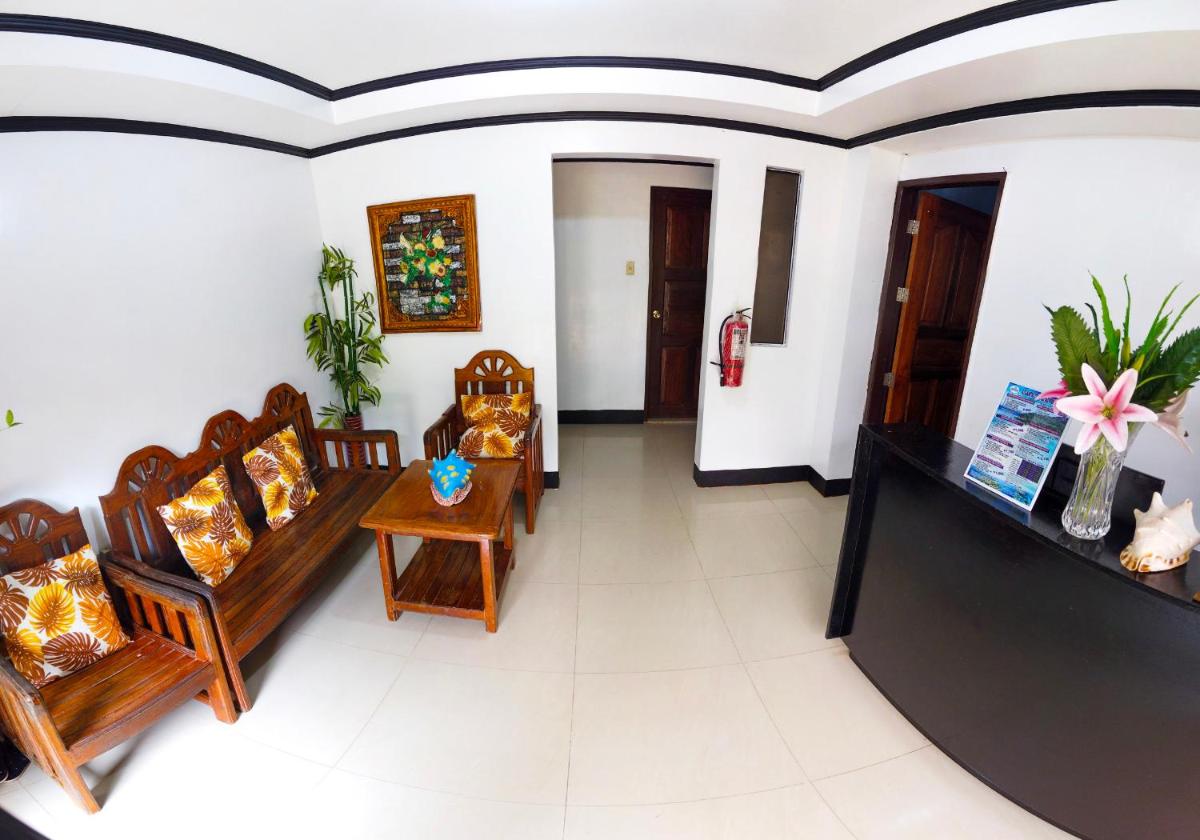 Amparo's Tourist Inn - Coron - Housity