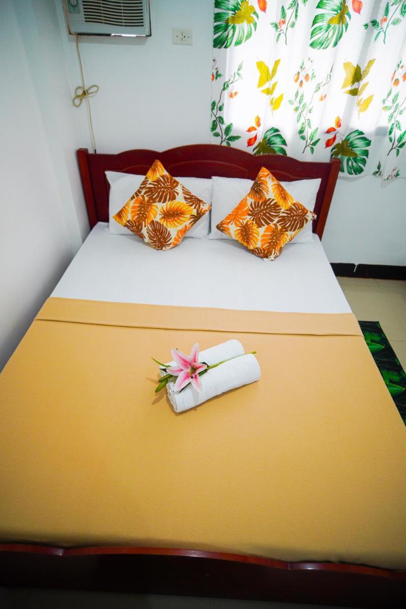 Suitetrails - Amparo's Tourist Inn - Coron