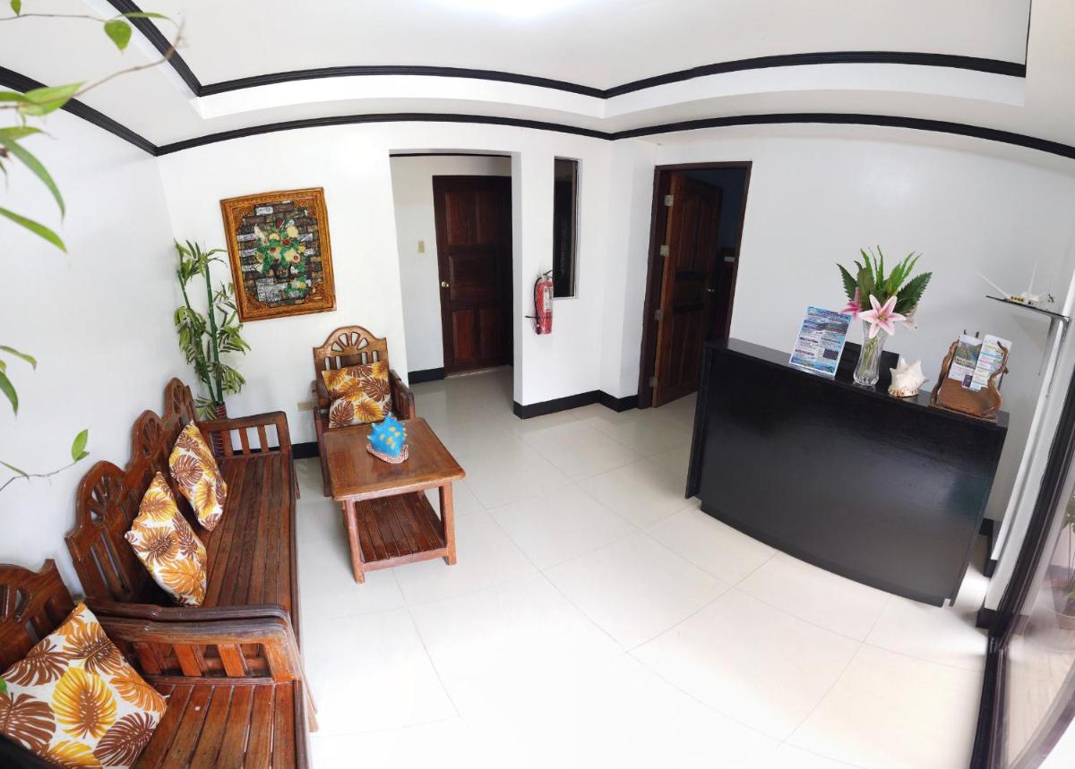 Amparo's Tourist Inn - Coron - Housity