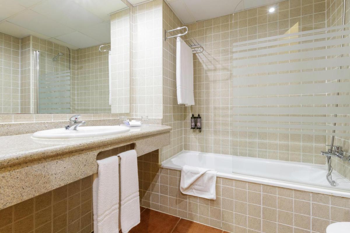 Un baño de Hotel Best Alcázar