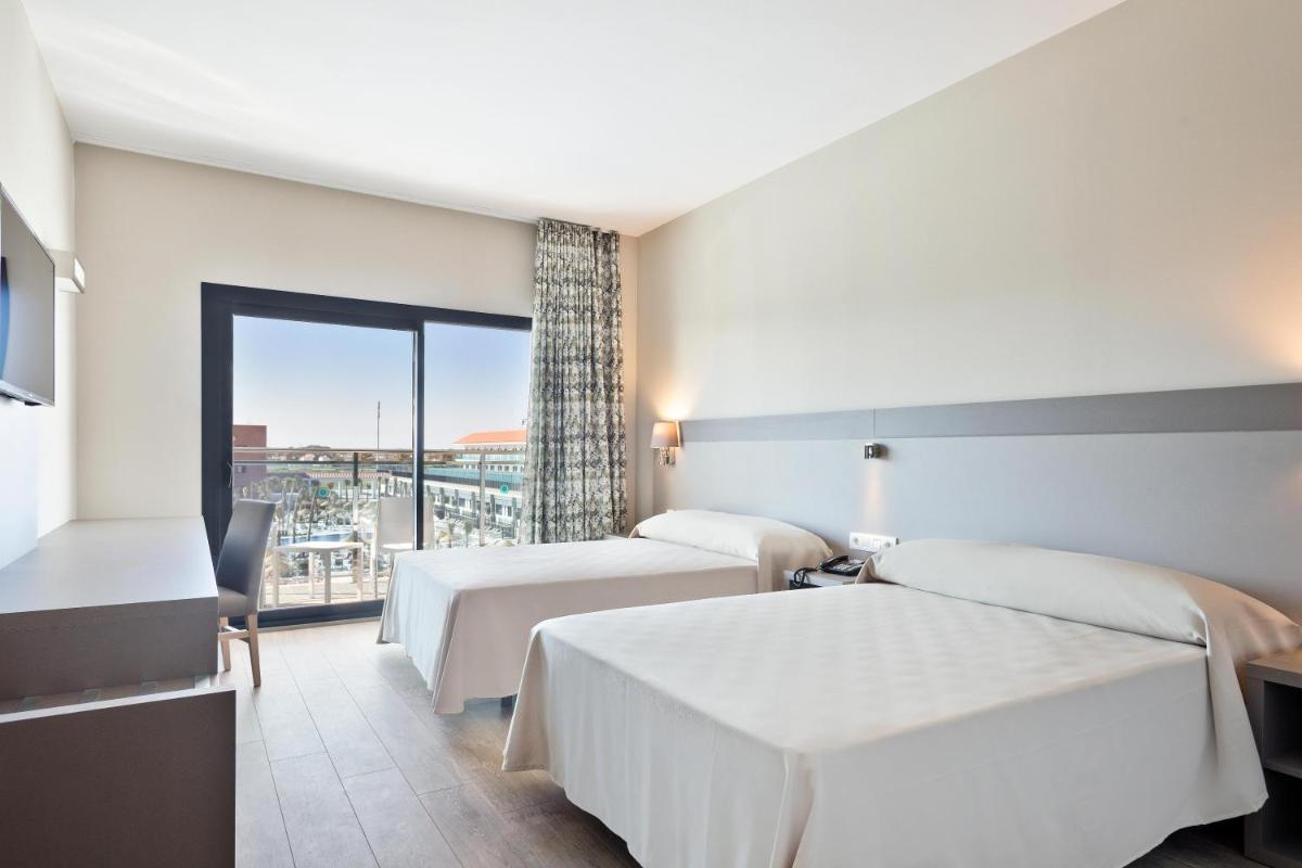 Cama o camas de una habitación en Hotel Best Costa Ballena