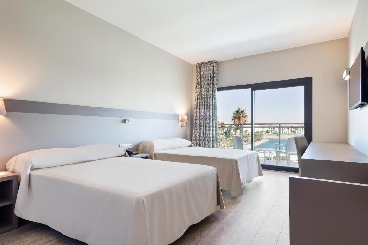 Cama o camas de una habitación en Hotel Best Costa Ballena