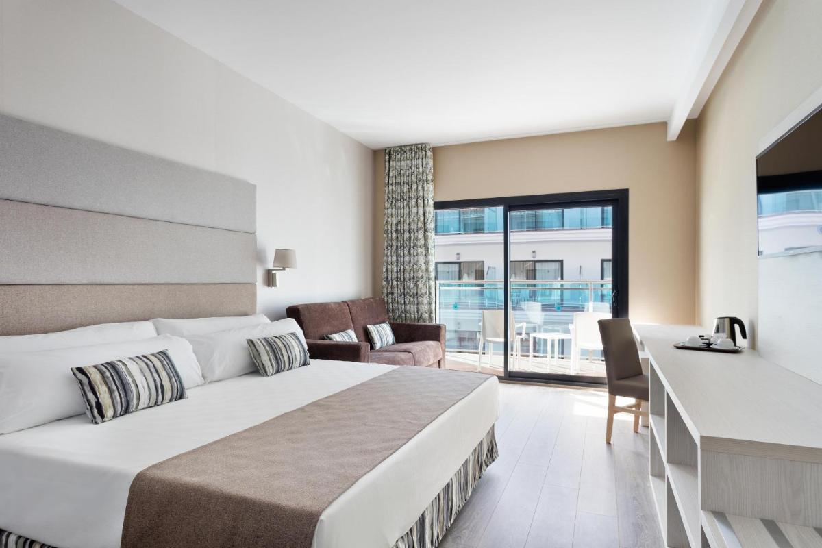 Cama o camas de una habitación en Hotel Best Costa Ballena