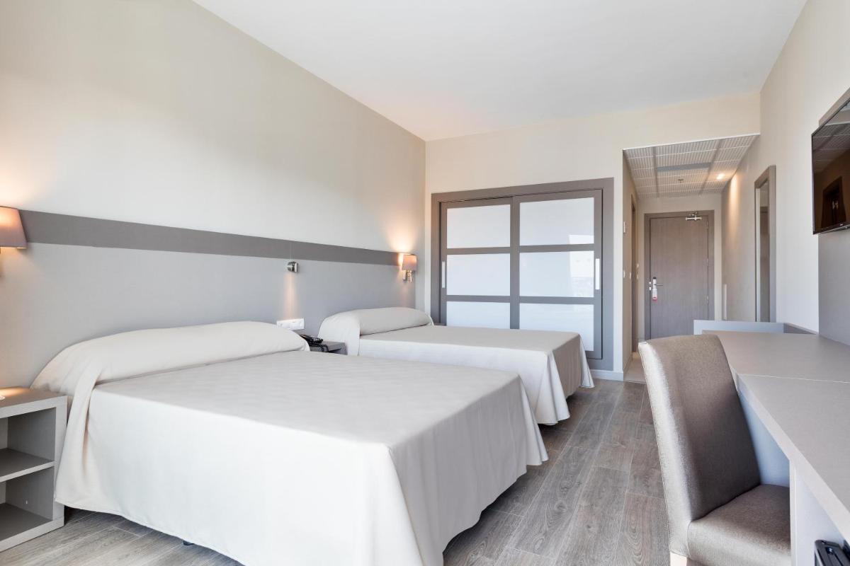 Cama o camas de una habitación en Hotel Best Costa Ballena
