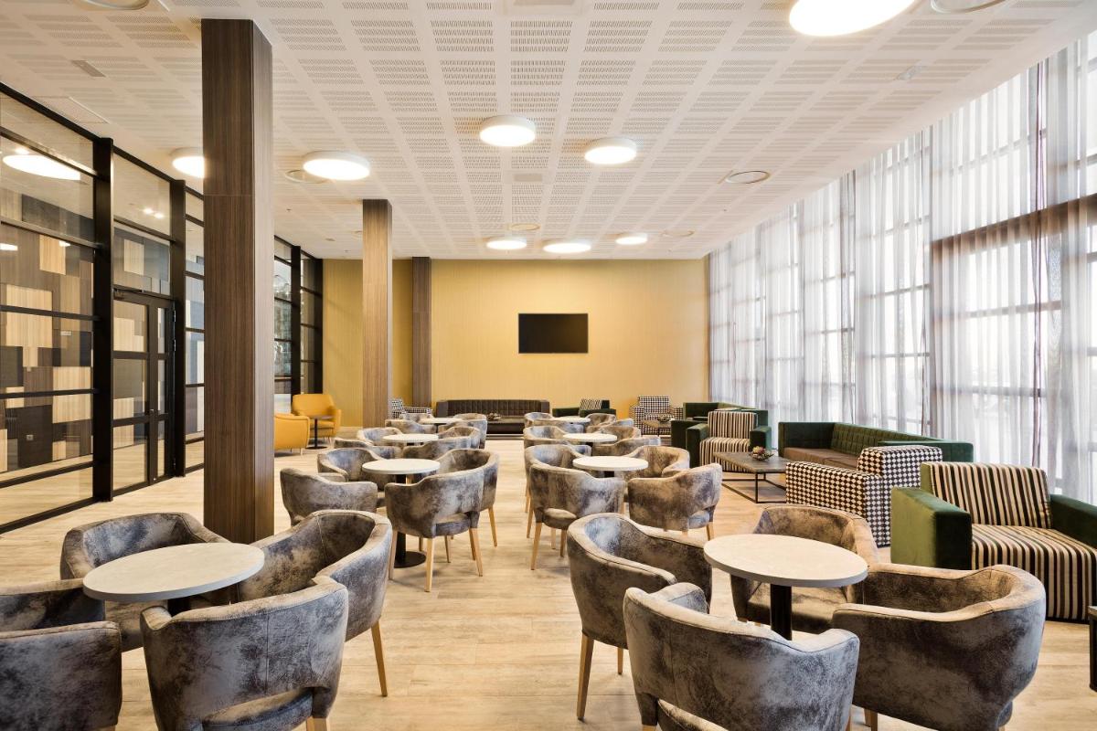 Zona de estar de Hotel Best Costa Ballena