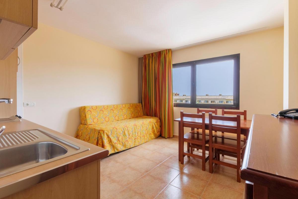 Zona de estar de Apartamentos Best Alcazar
