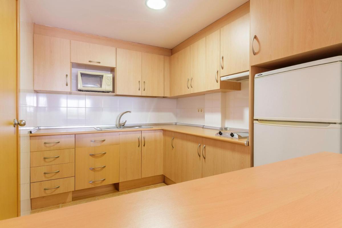 Una cocina o zona de cocina en Apartamentos Best Alcazar