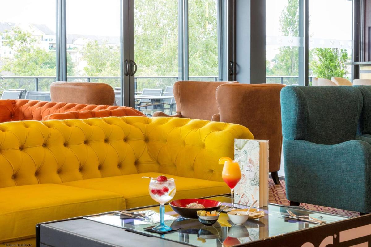 Coin salon dans l'établissement Aiden by Best Western T'aim Hotel & SPA