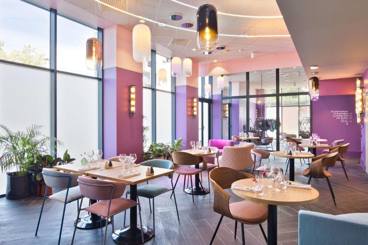 Restaurant ou autre lieu de restauration dans l'établissement Aiden by Best Western Clermont-Ferrand Hotel & Spa