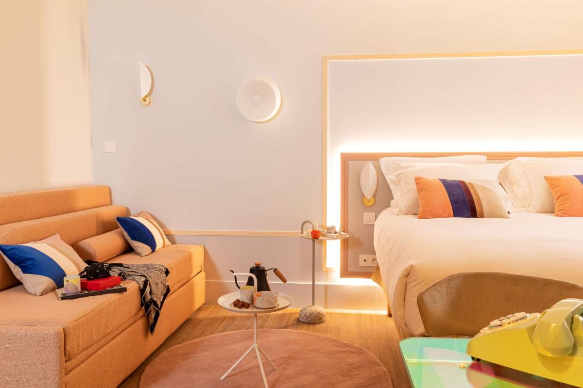 Un ou plusieurs lits dans un hébergement de l'établissement Aiden by Best Western Clermont-Ferrand Hotel & Spa