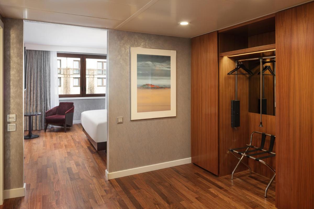 Ein Bett oder Betten in einem Zimmer der Unterkunft Hilton Berlin